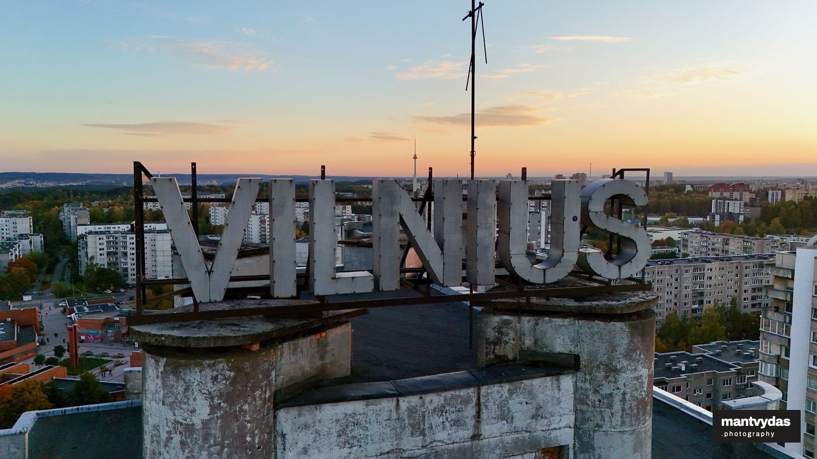 VILNIUS rooftop sign, autumn golden hour