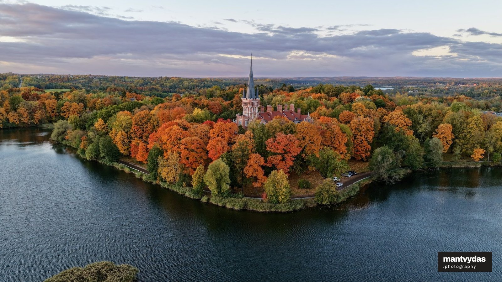 Lentvaris Manor and lake, autumn golden hour